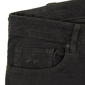 matière velours dans une coupe jean pour homme, couleur gris